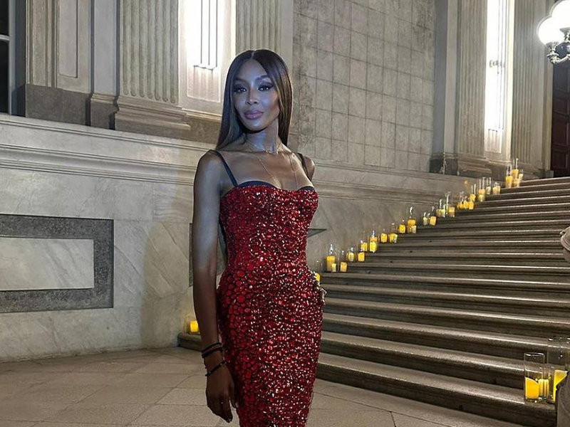 Naomi Campbell wearing a sparkly red dress