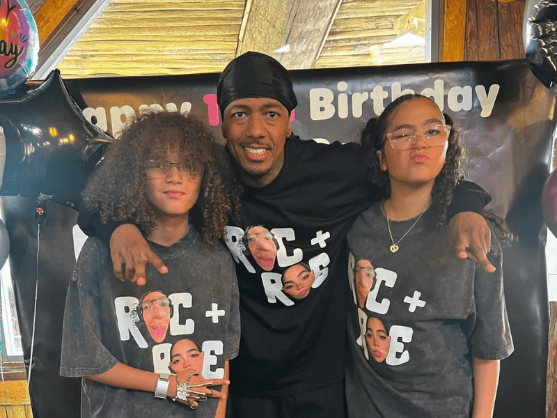 Nick Cannon poses with his twins Roc and Roe