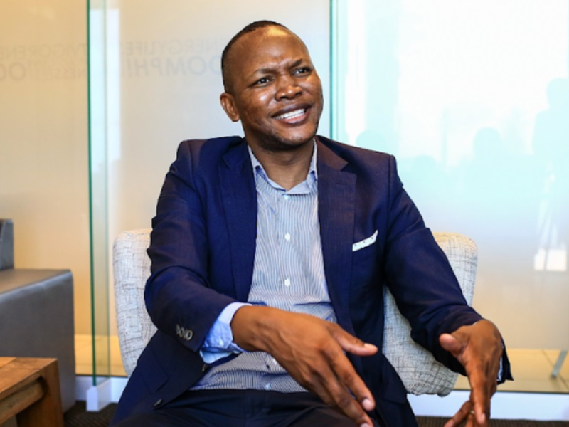 Nkosana Makate wearing a blue suit