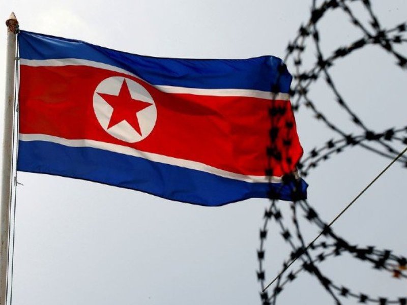 North Korea flag and barb wire
