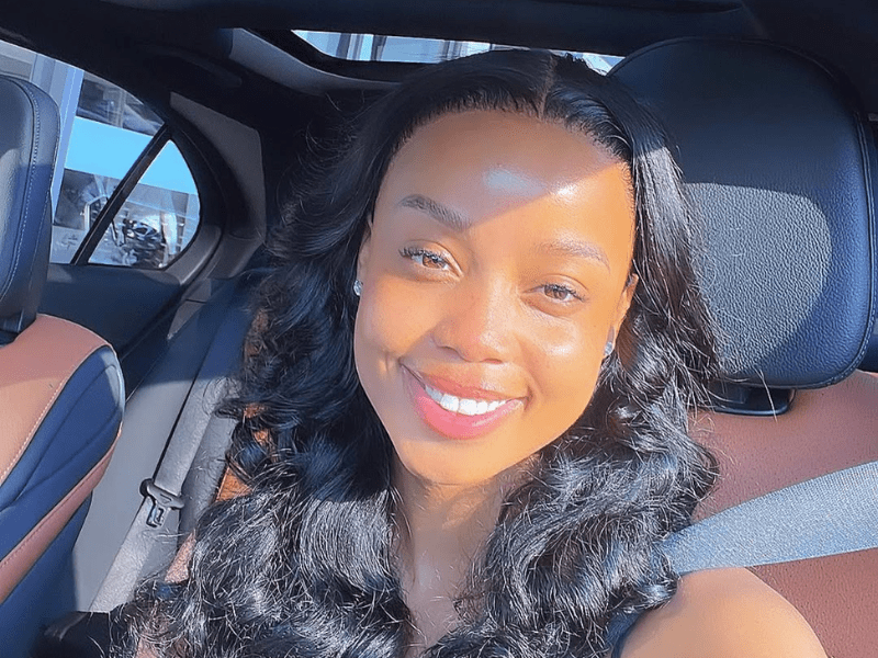 Ntando Duma smiles while taking a car selfie