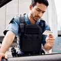 Officer holding a driving licence card