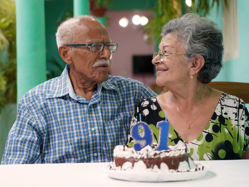Elderly couple celebrating a birthday
