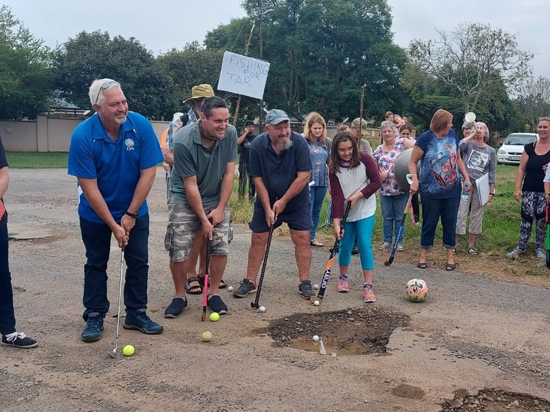 PMB residents tee off on pothole-ridden roads 1