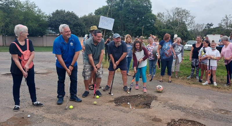 PMB residents tee off on pothole-ridden roads 1