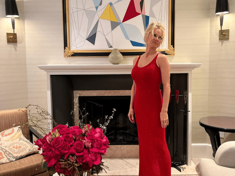 Pamela Anderson wearing a red dress