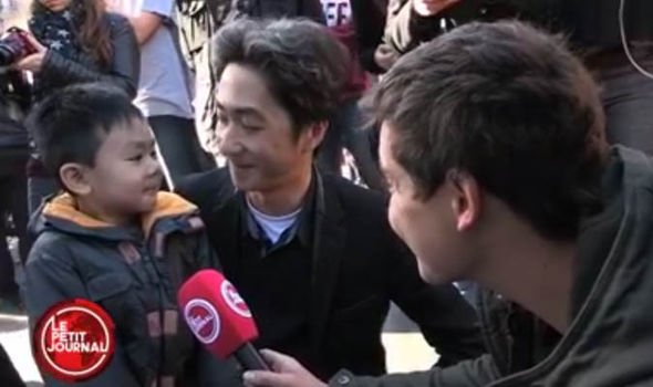 Father helps young son understand Paris attacks