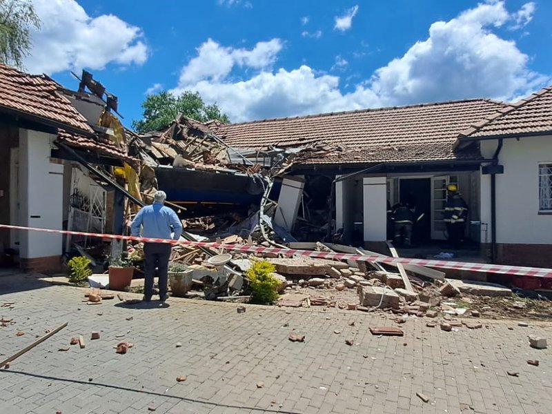 Passenger killed after truck crashes into several PMB homes