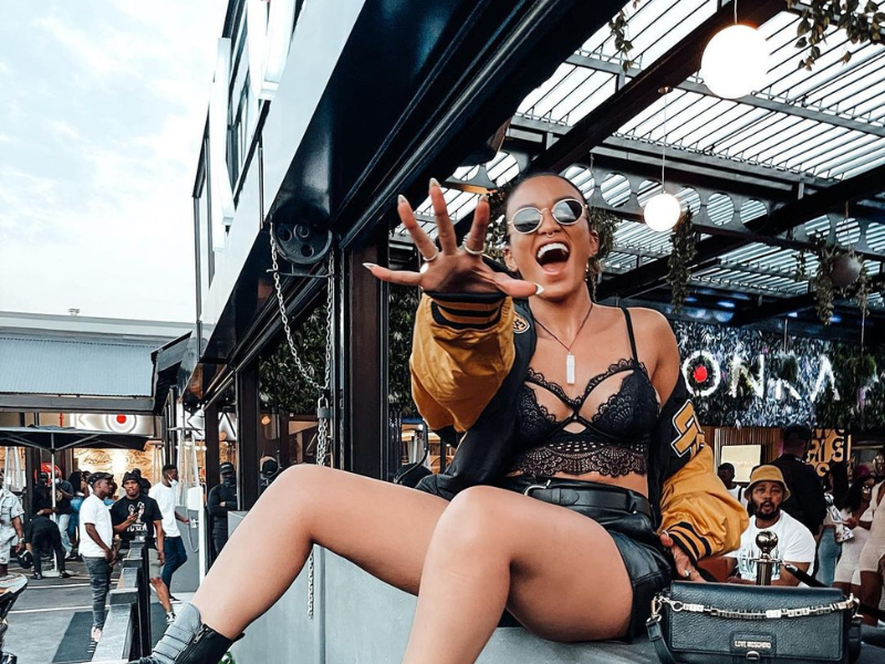 Pearl Thusi wearing black sunglasses .png