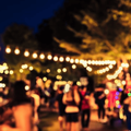 People walking around a moonlight market