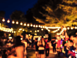 People walking around a moonlight market