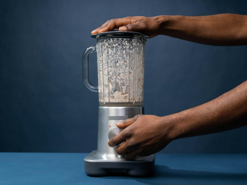 Person using a blender