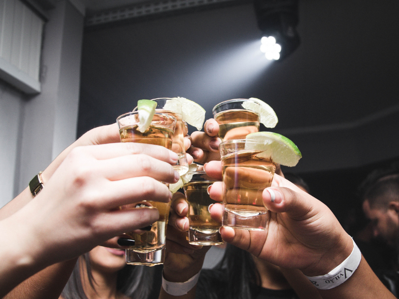 Photo of people doing cheers