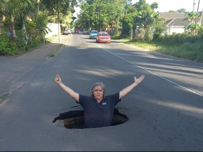 Community activist reports live from Pinetown pothole.