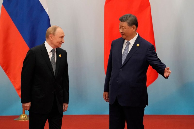 Vladimir Putin and Xi Jinping
