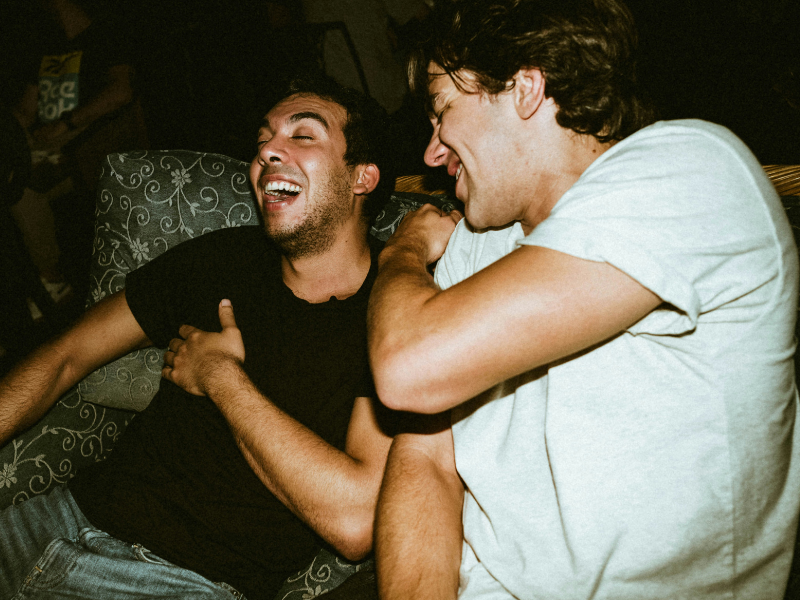 MEN LAUGHING
