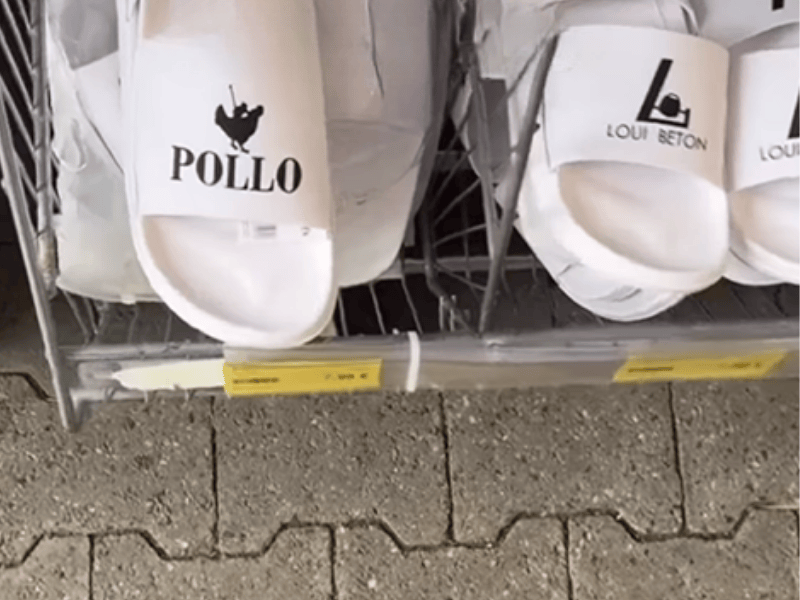 Racks of sandals with knockoff names