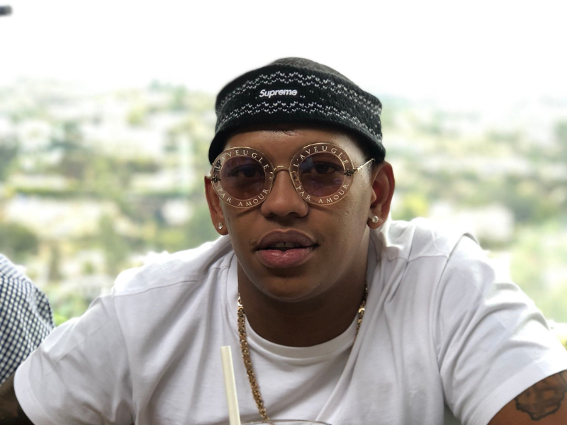 Da L.E.S. wearing sunglasses and beanie