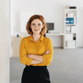 Red head woman in a office setting