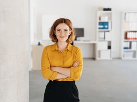 Red head woman in a office setting