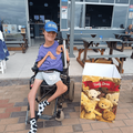 Reece Smith sitting on his wheelchair at the Amanzimtoti beach