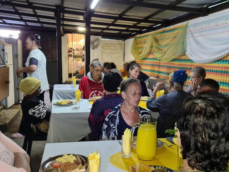 Residents at Angels Care KZN seated together for a meal