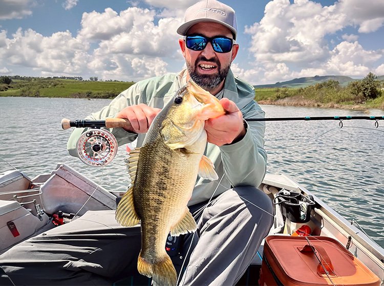 Rhuan Human with a Bass on fly caught at Mearns dam