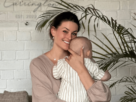 Rolene Strauss holds her baby boy close to her chest