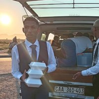 Ronaldinho Norman feeding disadvantaged community