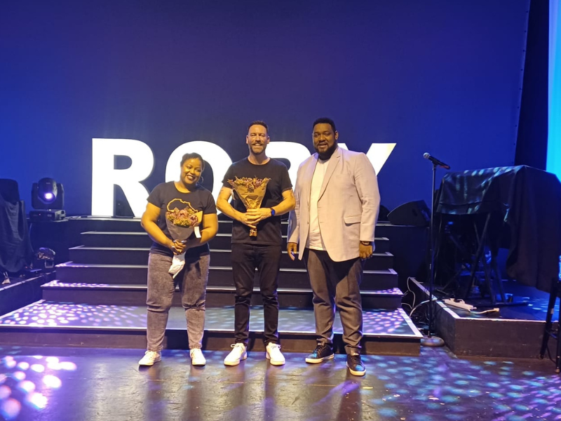 Rory Petzer, Carol Ofori and Carvin Goldstone on stage at the Barnyard Theatre