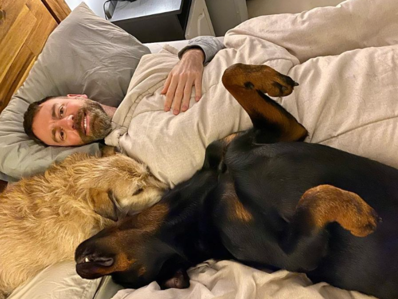 Rory Petzer and his dogs at home
