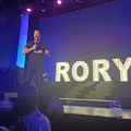 Rory Petzer stands on stage for his solo comedy show