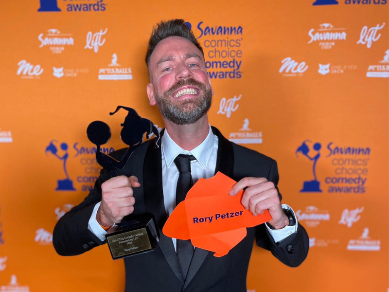 Rory Petzer with his award at the Comics' Choice Award