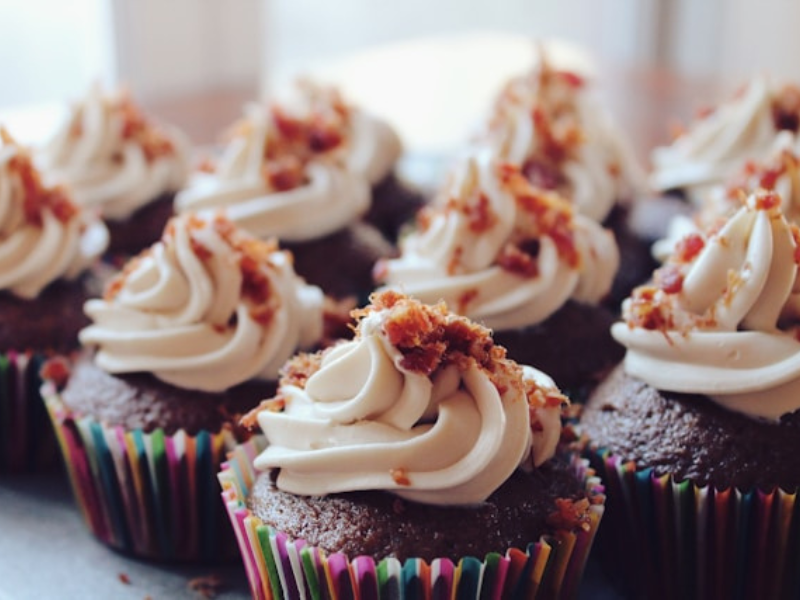 Rows of cupcakes with icing