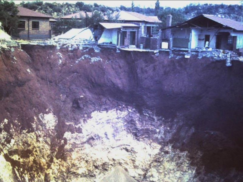 a gigantic sinkhole opened up beneath the home of the Oosthuizen family in the mining town.