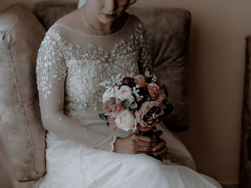 Sad bride in faded colours