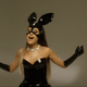 Ariana Grande singing "Dangerous Woman"