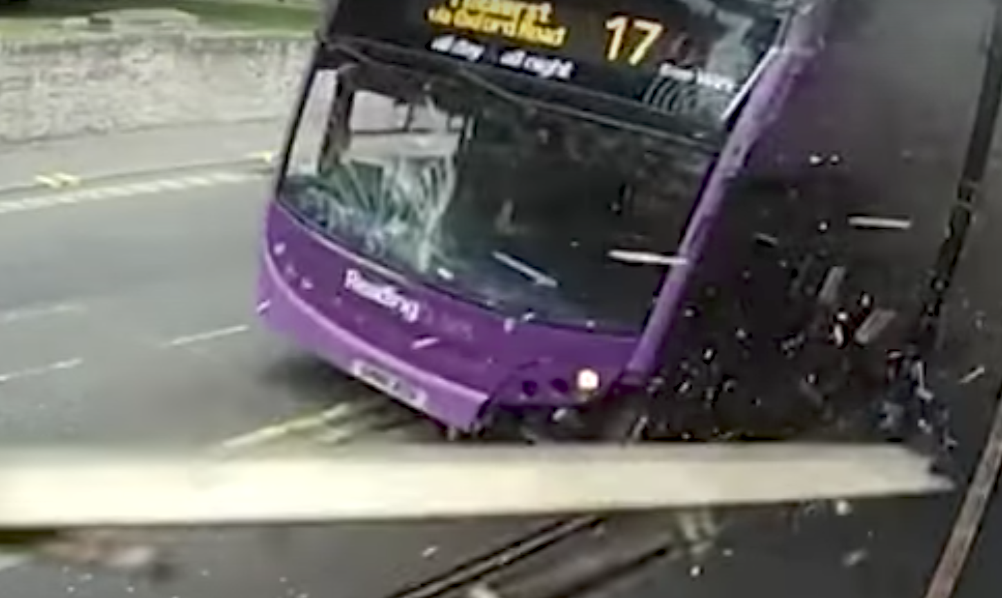 bus crashes into man