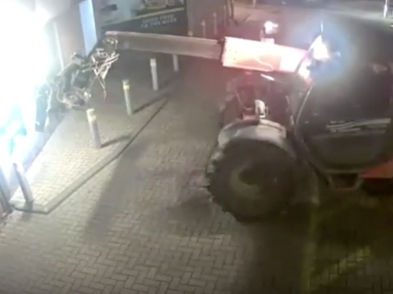 Thieves use digger to smash wall and steal ATM