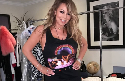 Mariah Carey goes topless for Paper Magazine