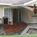 Family escapes just in time as sinkhole opens up and swallows their home