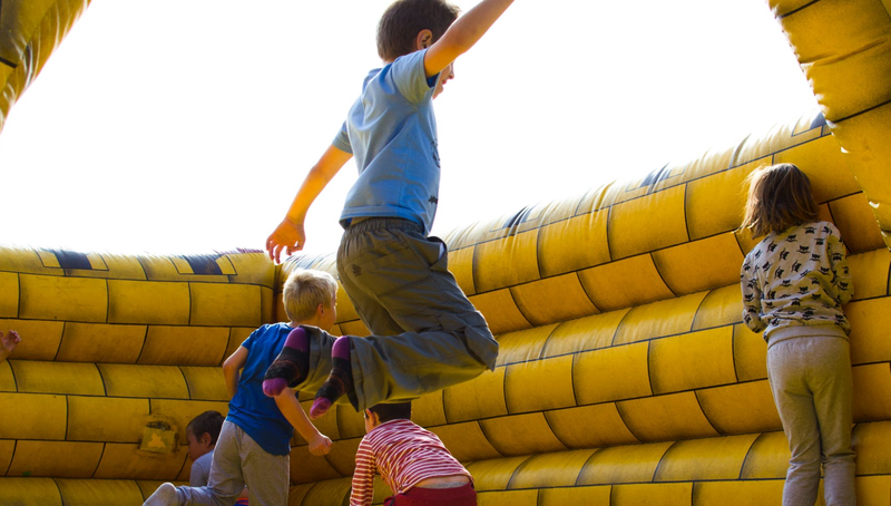 kids in jumping castle pexels