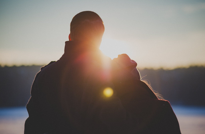 couple with backs facing to camera pexels