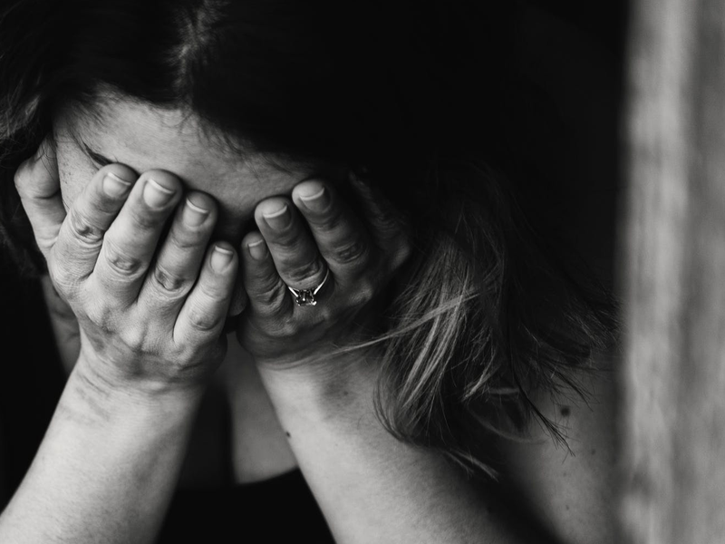 woman abuse hands in face pexels