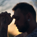 man praying pexels