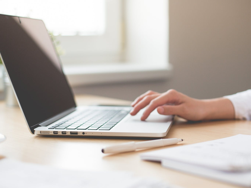 laptop with hands pexels