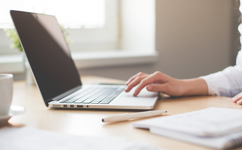 laptop with hands pexels