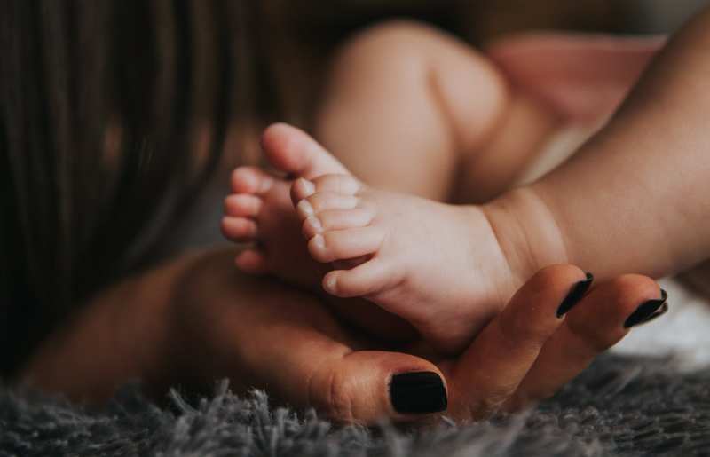 newborn baby with mom pexels