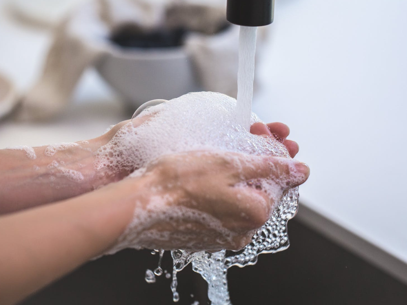 man washing hands pexels