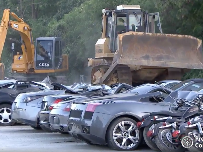 Luxury cars destroyed